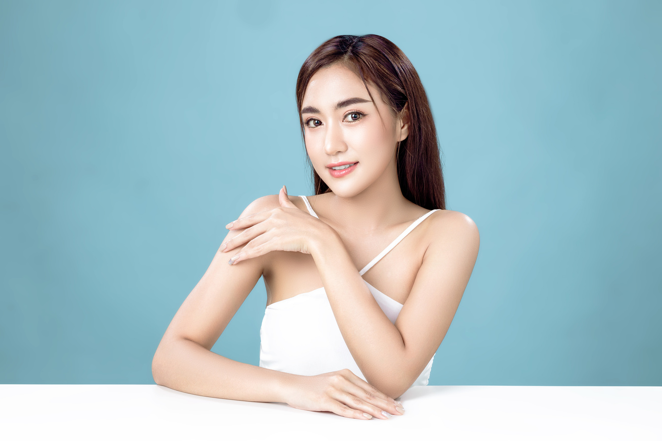 Asian woman with a beautiful face and Perfect clean fresh skin.